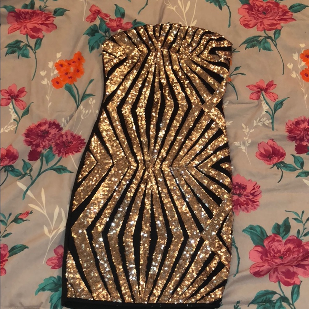 Black and gold sequin dress